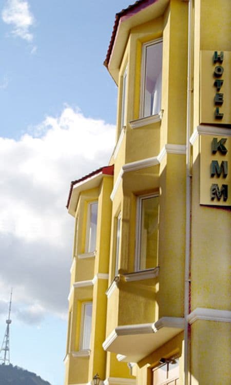 КММ