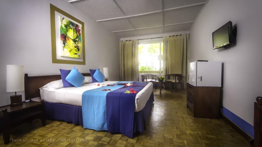 Palm Village Hotel
